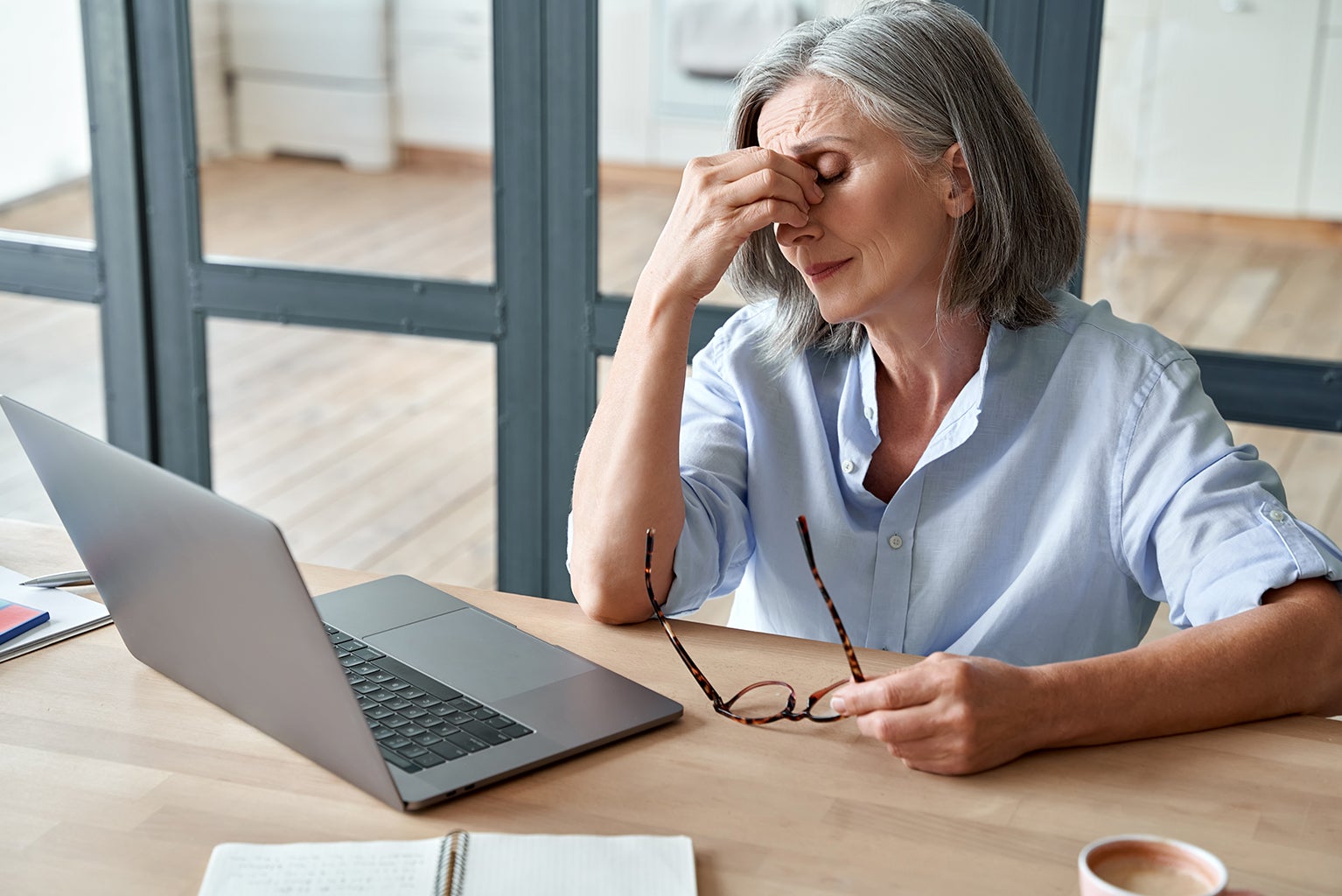 Woman distressed with computer