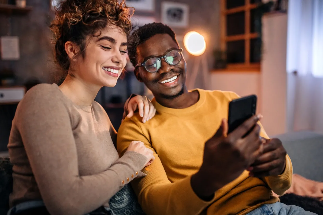 Couple looking at phone