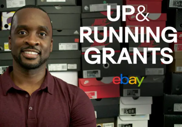 eBay seller with shoeboxes and Up & Running Grants text