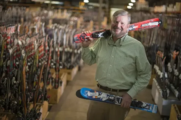 eBay seller holding skis