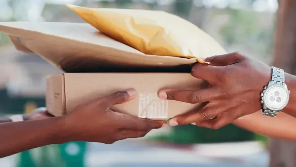 hands holding packages