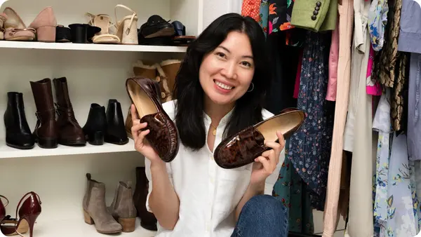 eBay Seller Michelle Nguyen holding a pair of brown shoes